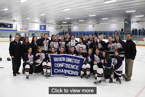 Girls hockey team and coaches