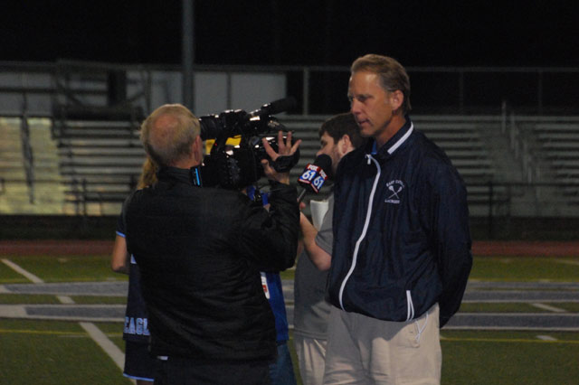 Coach Wilcox being interviewed by channel Fox 61