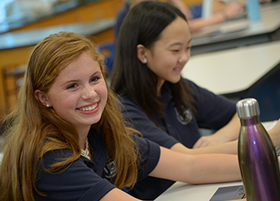 two smiling female students