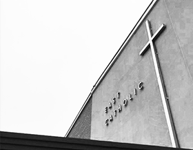 East Catholic sign on building
