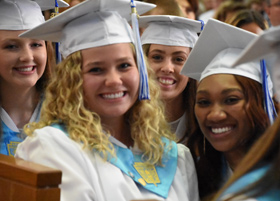 Smiling graduates