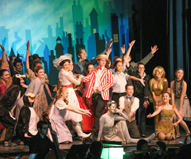 Students performing Mary Poppins on stage